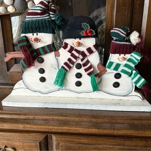 Cute wooden snowmen